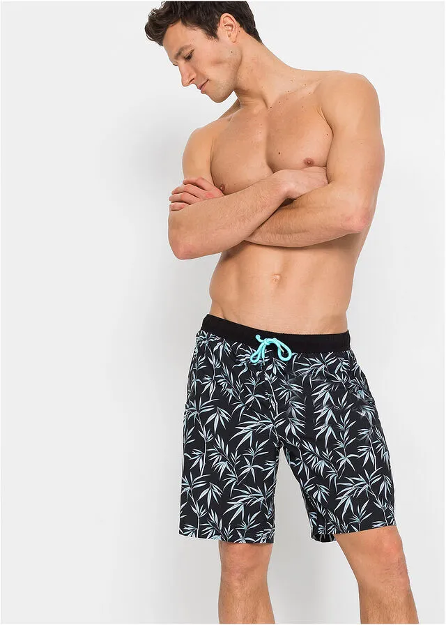 BAñADOR DE HOMBRE NEGROBLANCO DE FLORES