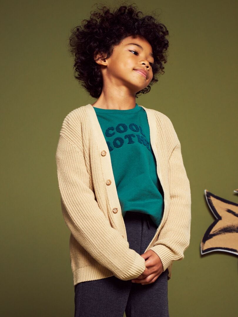 CHAQUETA DE PUNTO PERLADO  BEIGE