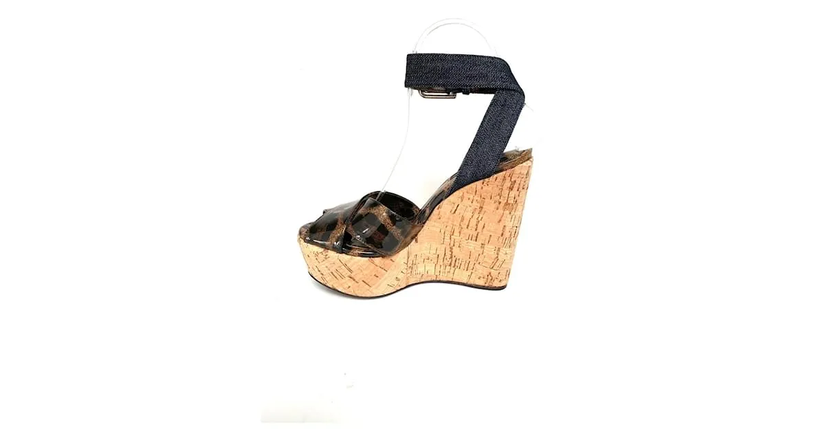 Dolce & Gabbana Mulas de cuña Estampado de leopardo 