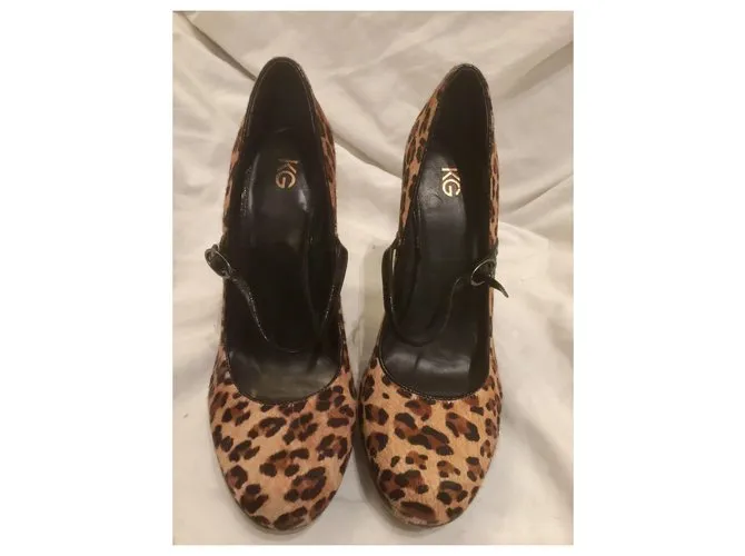 Kurt Geiger Piel de becerro estilo poni Mary Janes Estampado de leopardo 