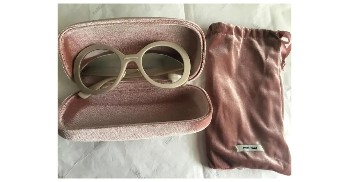 Miu Miu Lentes de sol Beige 