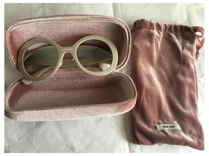 Miu Miu Lentes de sol Beige 