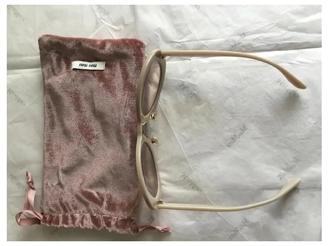 Miu Miu Lentes de sol Beige 