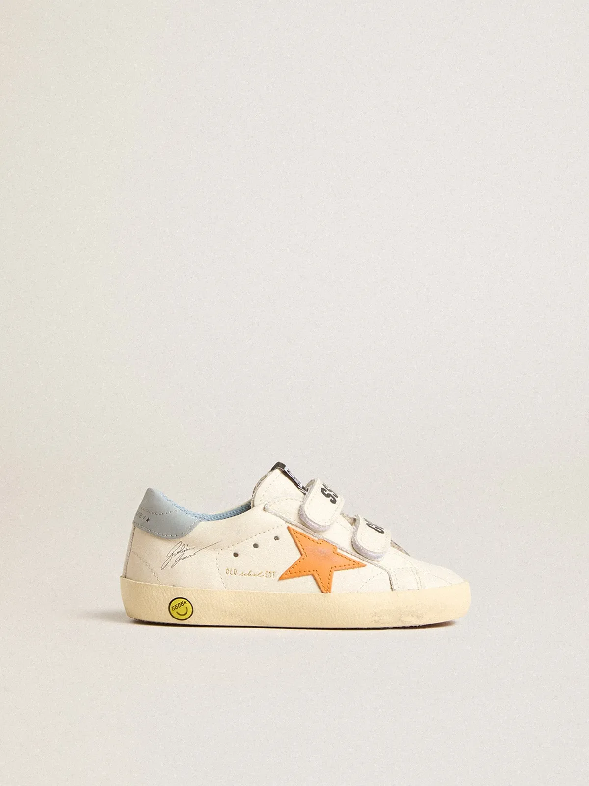Old School Junior de piel con estrella naranja y refuerzo del talón azul bebé
