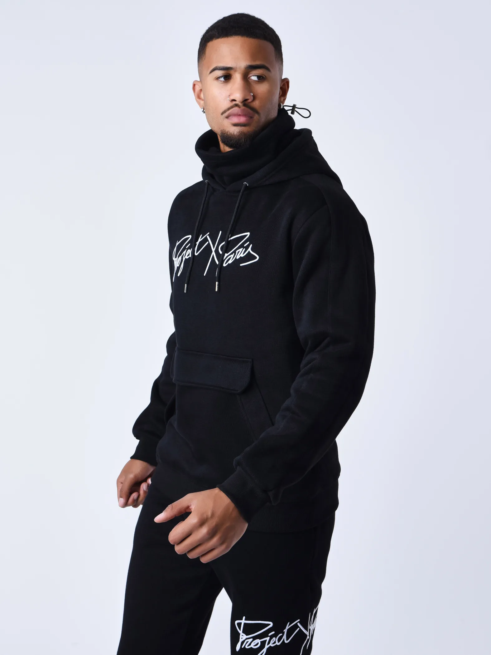 Sudadera de punto con capucha y cuello alto