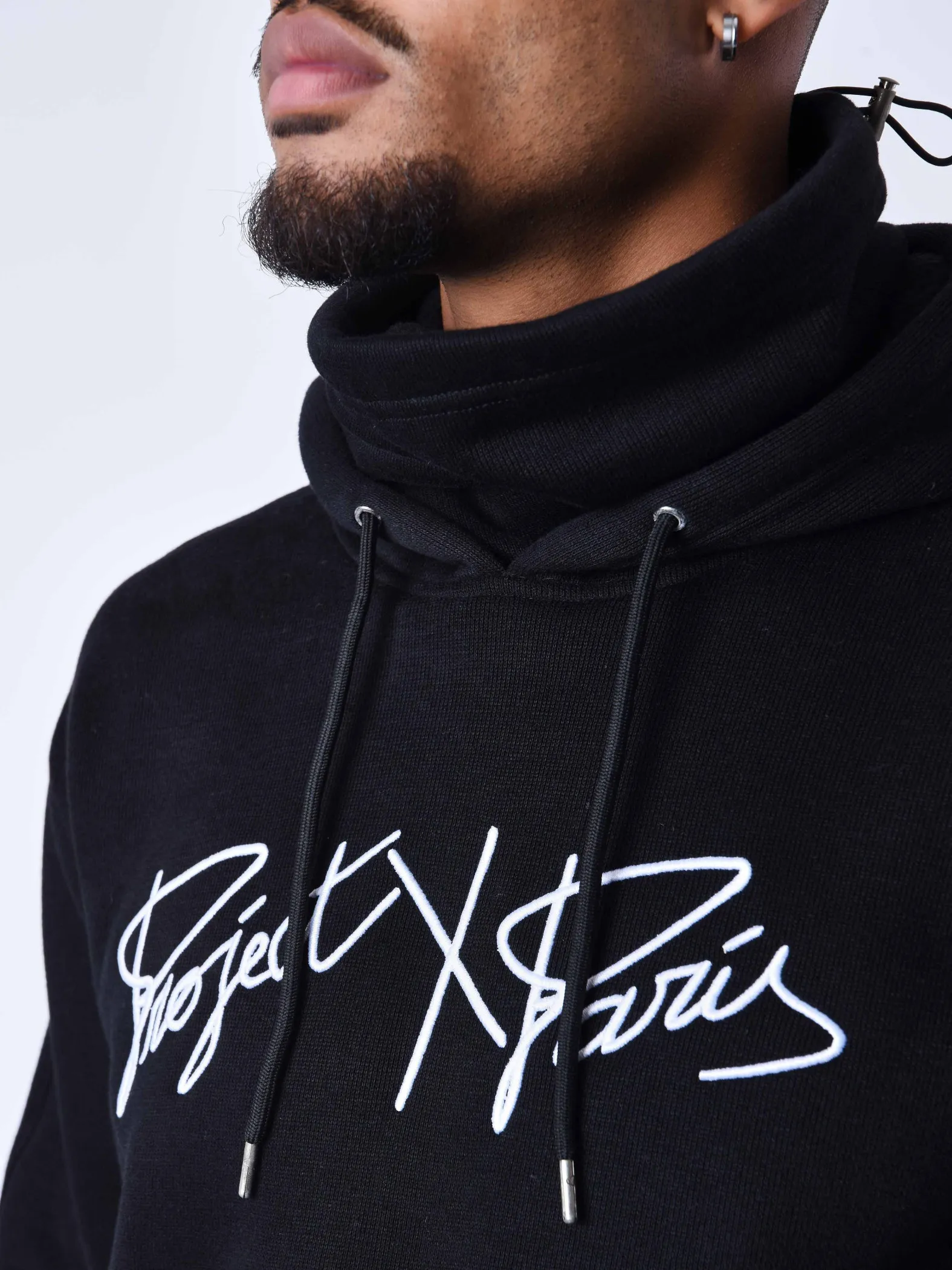Sudadera de punto con capucha y cuello alto