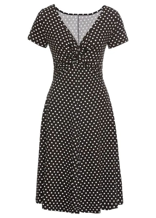 VESTIDO DE PUNTO DE VISCOSA SOSTENIBLE NEGROBLANCO DE LUNARES