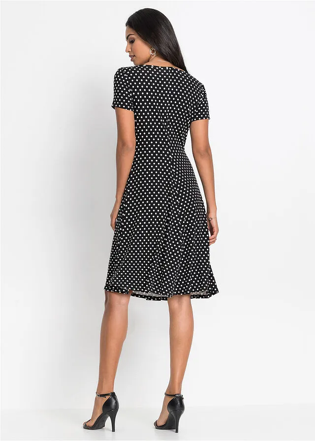 VESTIDO DE PUNTO DE VISCOSA SOSTENIBLE NEGROBLANCO DE LUNARES
