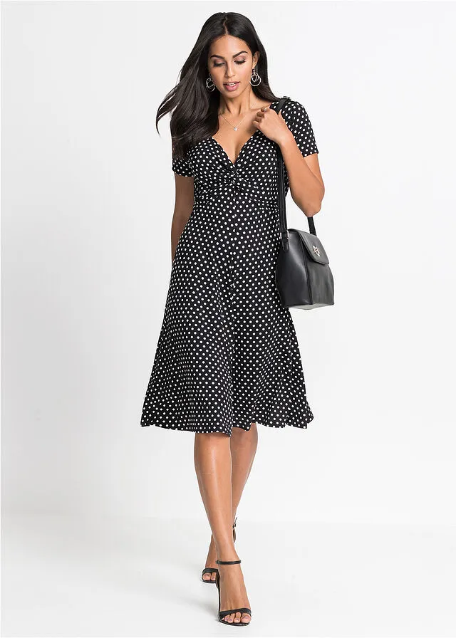 VESTIDO DE PUNTO DE VISCOSA SOSTENIBLE NEGROBLANCO DE LUNARES