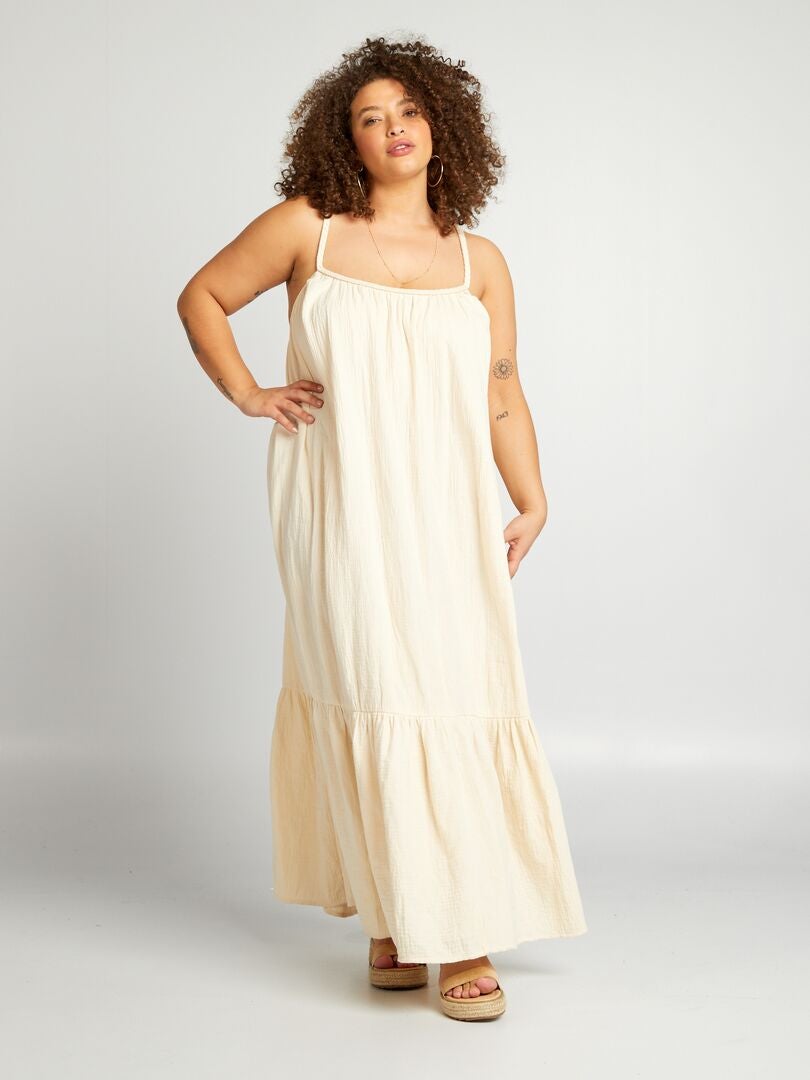 VESTIDO LARGO CON VOLANTE Y TIRANTES TRENZADOS  BEIGE