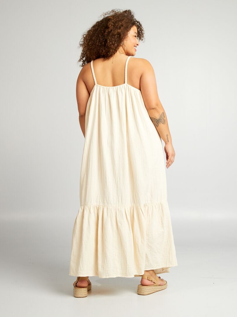 VESTIDO LARGO CON VOLANTE Y TIRANTES TRENZADOS  BEIGE